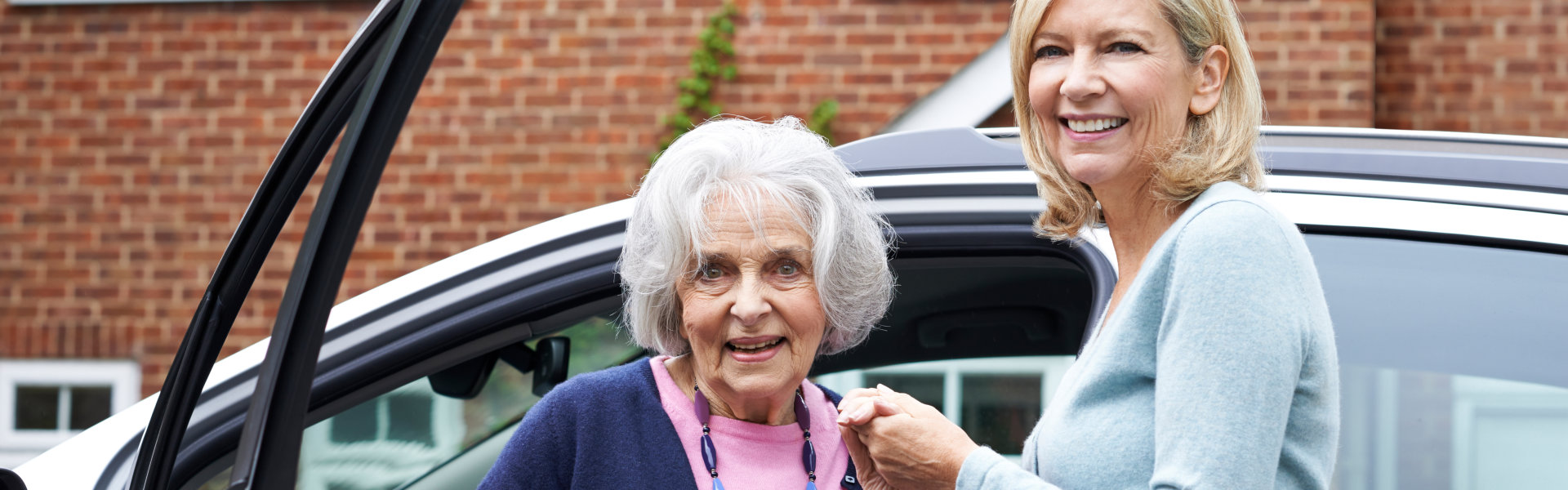 Female Neighbor Gives Senior Woman A Lift In Car